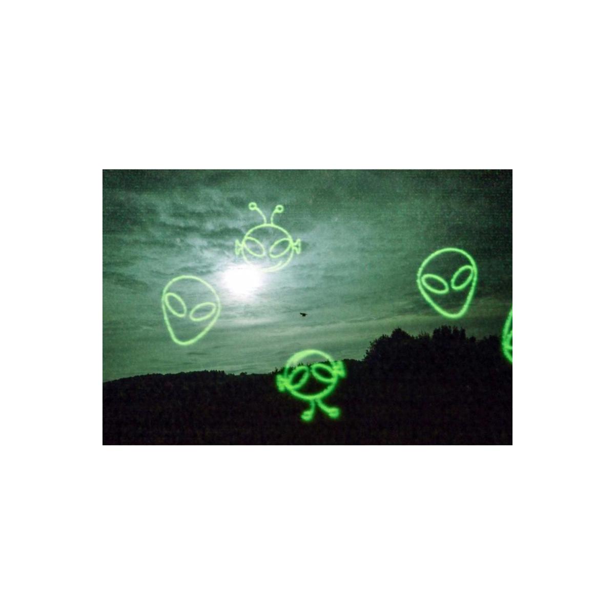 Green-tinted landscape shot on KONO! Alien 200 35mm film featuring glowing green alien head overlays in the sky.