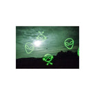 Green-tinted landscape shot on KONO! Alien 200 35mm film featuring glowing green alien head overlays in the sky.