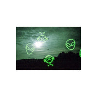 Green-tinted landscape shot on KONO! Alien 200 35mm film featuring glowing green alien head overlays in the sky.