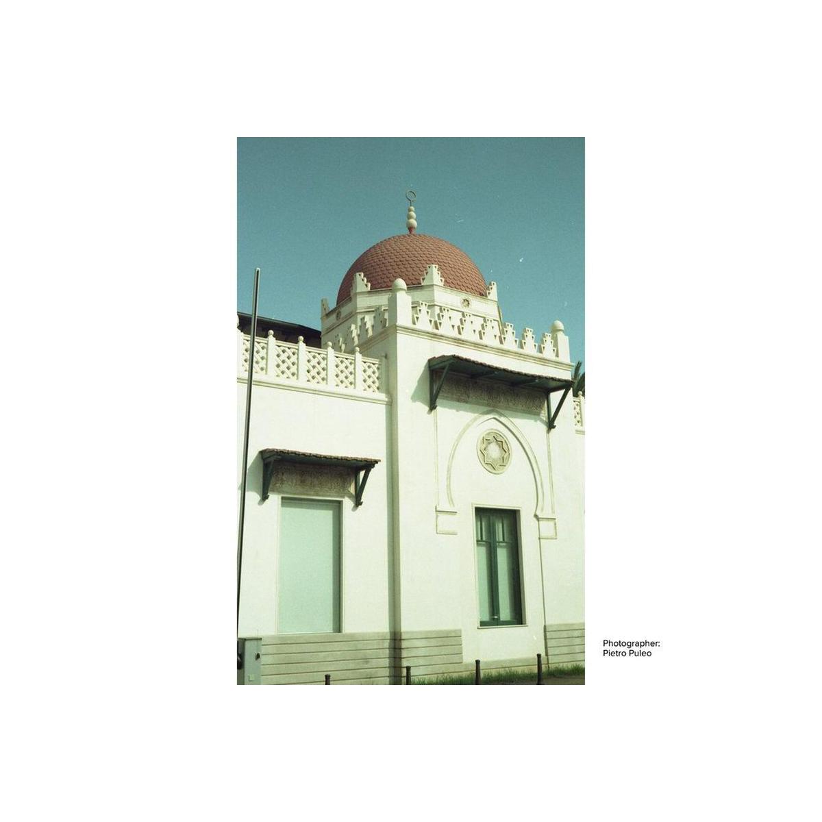 White building with a red dome and pinkish, candy-toned color shifts captured on KONO! Candy 200 35mm film.