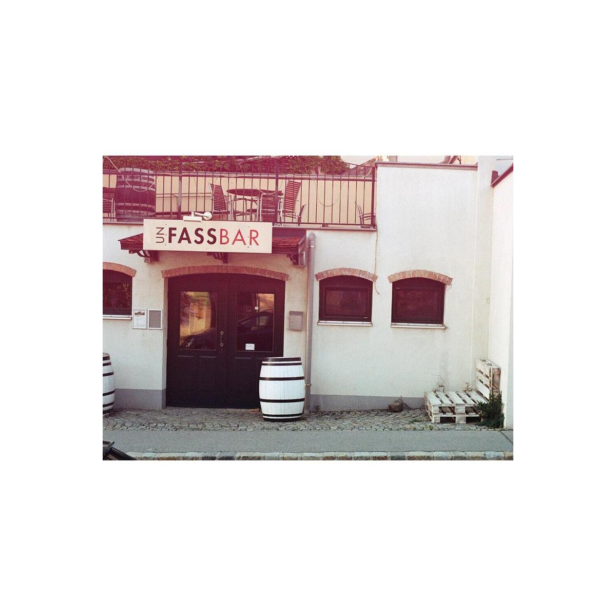 Street view of Fassbar with warm, experimental color shifts and soft light tones captured on KONO! Mirage 200 35mm film.