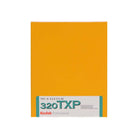 A yellow Kodak Tri-X 320 film roll pack, model 320TXP, with a white and teal label at the bottom, shown against a plain white background.