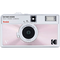 Pink and white Kodak Ektar H35N half-frame 35mm film camera with a 22mm lens and built-in flash.