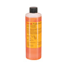 A bottle of Kodak Professional Indicator Stop Bath liquid with orange liquid inside, a yellow label, and a black cap, shown on a white background.