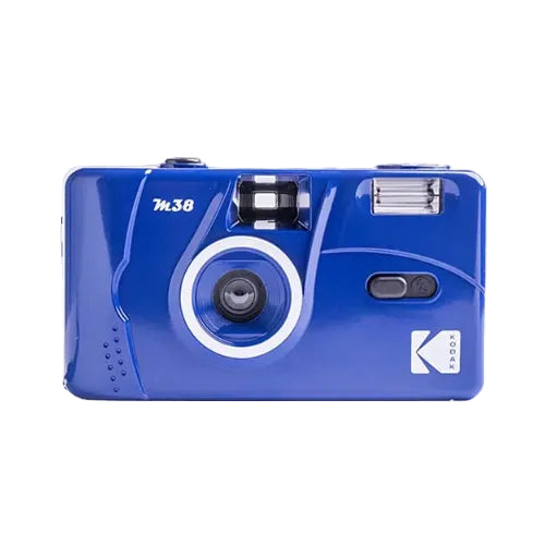 Glossy blue Kodak M38 35mm film camera with a fixed-focus lens, built-in flash, and white branding on a lightweight plastic body.