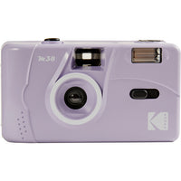 Light purple Kodak M38 35mm reusable film camera with a fixed-focus lens and built-in flash in a compact plastic body.