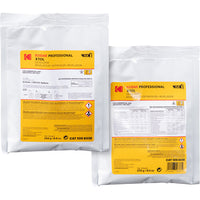 Two white Kodak Professional XTOL film processing pouches with yellow labels, shown on a plain white background. One pouch is front-facing and the other is angled to show the back label.