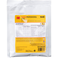 A white plastic bag of Kodak Professional XTOL film developer and developer-revealing agent, with a large yellow label on the front showing product details and a barcode.