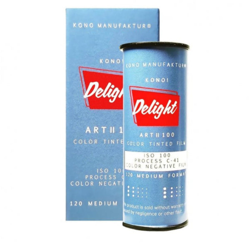 A canister of Delight Art11 Color Tinted Film next to its blue cardboard packaging box, featuring the red and white Delight logo on a clean white background.