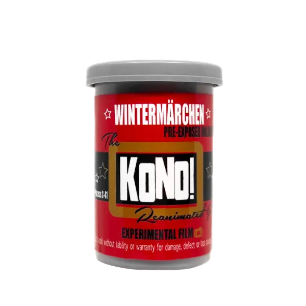 A cylindrical plastic canister of Kono! Wintermächen pre-exposed experimental film, featuring a red label with black and white text and a gray screw-on lid, isolated on a white background.