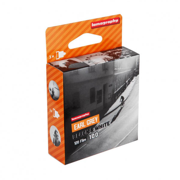 Lomography film packaging with orange and black design on a white background