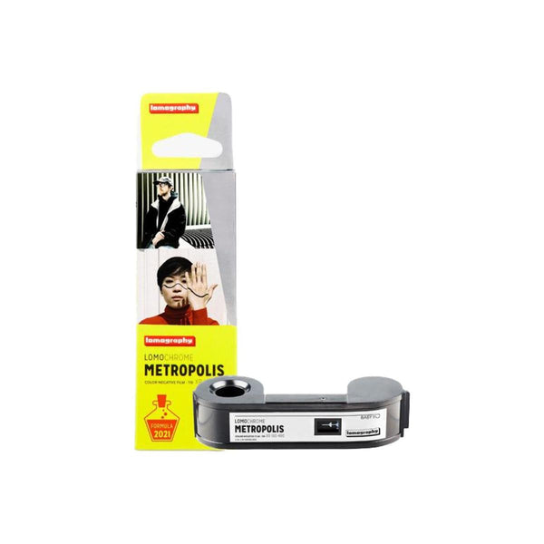 Lomography LomoChrome Metropolis 110 color negative film cartridge and its yellow and white retail packaging.