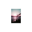 Golden Gate Bridge silhouette captured on 35mm film with dreamy purple, plum, and red color shifts.