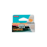 Single roll of LomoChrome Turquoise 120 color negative film in a teal and white box featuring a classic building graphic.
