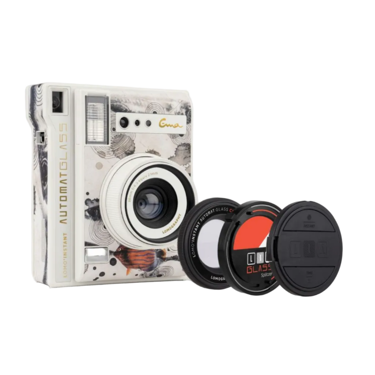 Lomo’Instant Automat Glass Ema Ichikawa Edition instant camera with a wide-angle glass lens, along with its packaging and additional lens attachments.