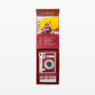 Fujifilm Instax Mini camera in red packaging with a yellow umbrella in the background.