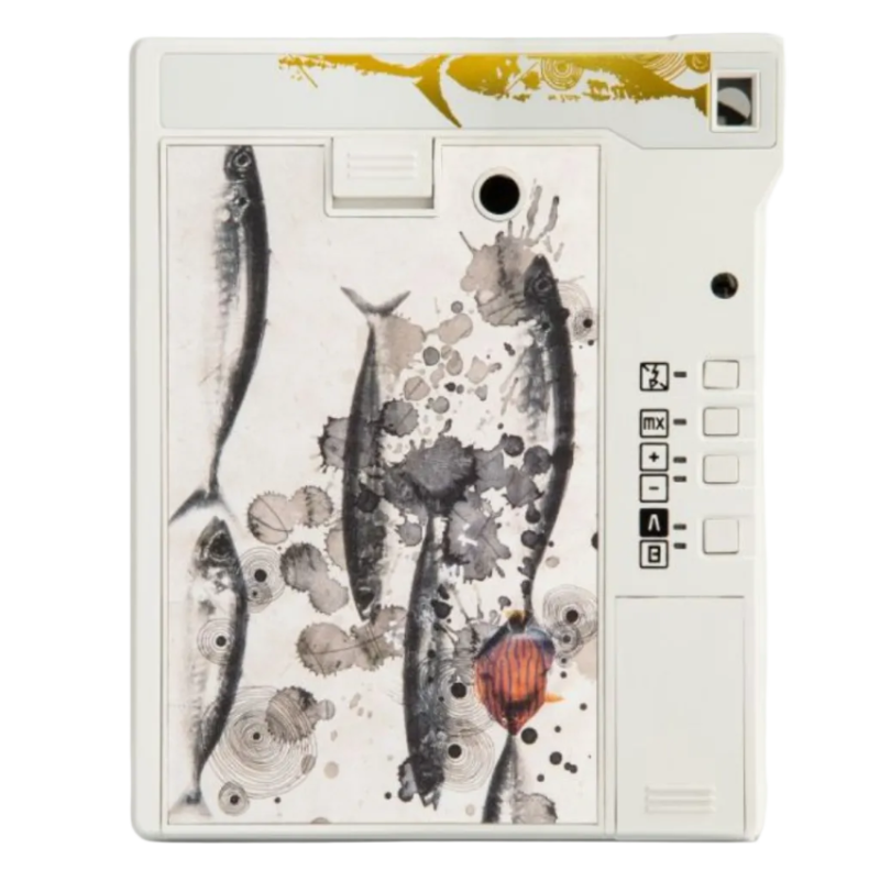 A white electronic device with a watercolor-style fish print on the front, featuring a side panel with buttons and a small display window.