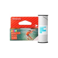 Single roll of Lomography 100 ISO 120 color negative film with its vibrant orange and white product packaging.