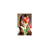 Portrait of a person holding a vibrant red tulip in front of their face, captured on 35mm color negative film.