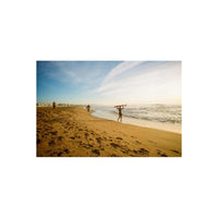 Surfers on a sunny beach captured with vibrant, fine-grain Lomography 400 color 35mm film.