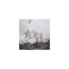 Black and white square-format film shot of a group of hikers standing before a cloudy, snow-capped mountain peak.
