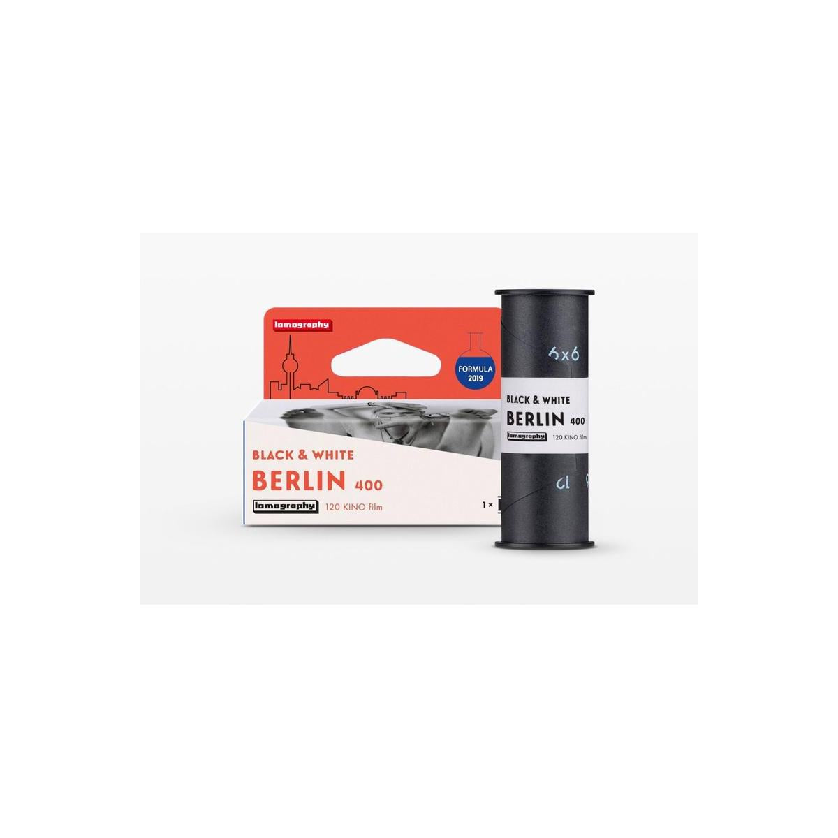 Lomography Berlin Kino 400 ISO 120 black and white film roll and its red and white branded cardboard box.