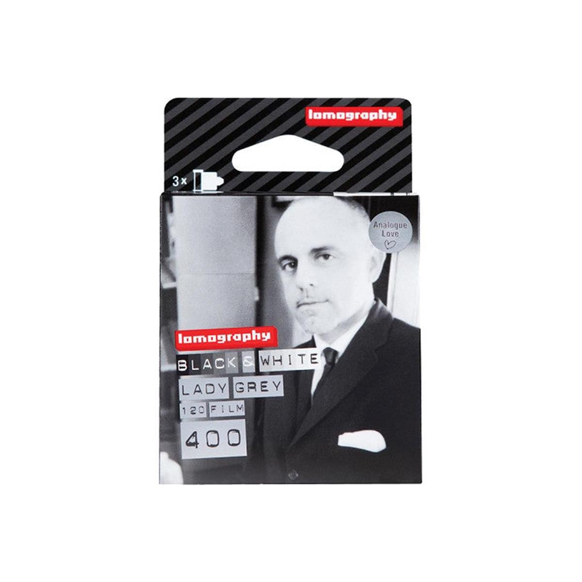 Lomography Lady Grey 400 ISO 120 black and white film box featuring a portrait of a man in a suit.