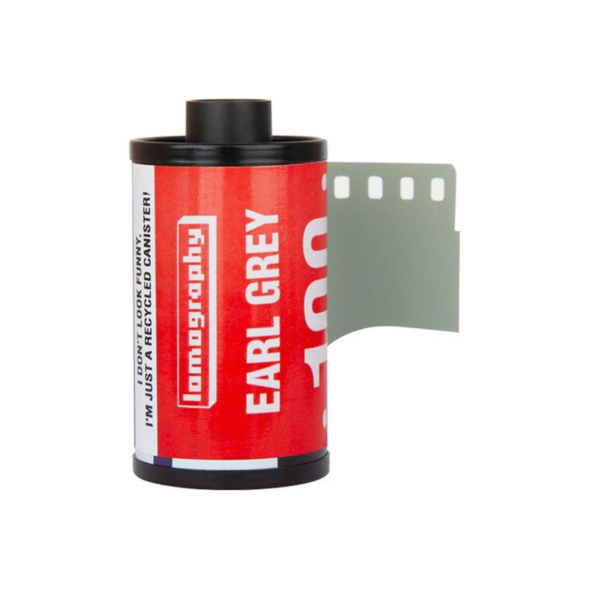 Lomography Earl Grey 100 ISO 35mm black and white film roll with a red label and partially extended film strip.