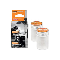 Lomography MonoChrome Duet 35mm film set with a retail box and two individual white metal film canisters.