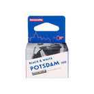 Lomography Potsdam Kino 100 ISO 35mm black and white film box with blue branding and cinematic photo illustration.