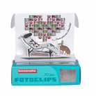 A box of Lomography Fotoclips, with clear and orange 3D clips visible, used for creating mosaics and collages.