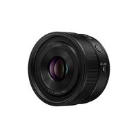 Black camera lens on a white background