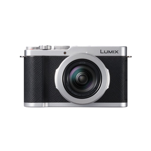 Silver and black camera with the logo name of Lumix on the front on a background