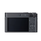 The rear view of a black Canon PowerShot Lix compact digital camera, showing the LCD screen and control buttons on a solid white background.