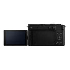 Black camera with a screen on a white background