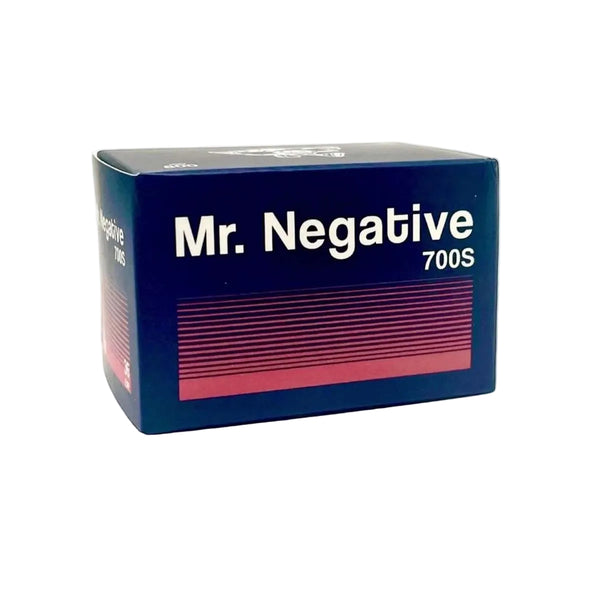 Mr. Negative 700S film canister packaging, featuring a dark blue box with white text and a pink striped pattern on the front, set against a plain white background.