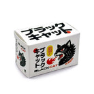 A white cardboard product box for BLACKCAT Japanese black cat-shaped snacks, featuring bold black and red Japanese text and a graphic of a black cat's head on a white background.