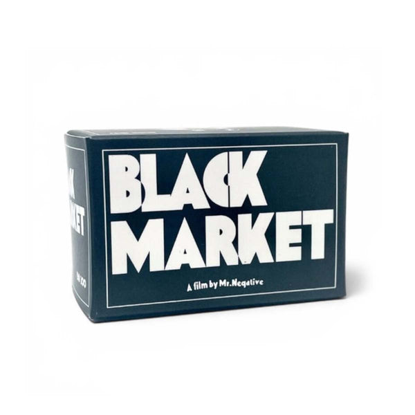 A rectangular product box for 'Black Market: A film by Mr. Negociave' featuring bold white text on a dark navy blue background, set against a plain white studio background.