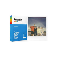 Polaroid Color 600 instant film box with 8 exposures and a sample glossy white-frame photo of friends on a beach.