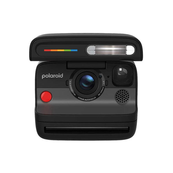 Matte black Polaroid Flip instant camera with a 4-lens autofocus system, built-in flash, and iconic rainbow color stripe.