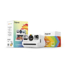 White Polaroid Go instant camera with a double pack of color film and branded packaging box on a white background.