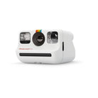 Compact white Polaroid Go instant camera featuring a front-facing selfie mirror, flash, and iconic rainbow logo.
