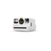 Compact white Polaroid Go instant camera featuring a front-facing selfie mirror, flash, and iconic rainbow logo.