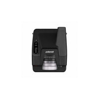 Top-down view of a black Polaroid I-2 instant camera featuring a prominent silver lens ring and digital exposure display.