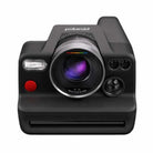 Matte black Polaroid I-2 instant camera featuring a prominent 98mm f/8 lens, LiDAR sensor, and iconic red shutter button.