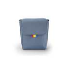 Blue rectangular bag with a colorful tag on a white background
