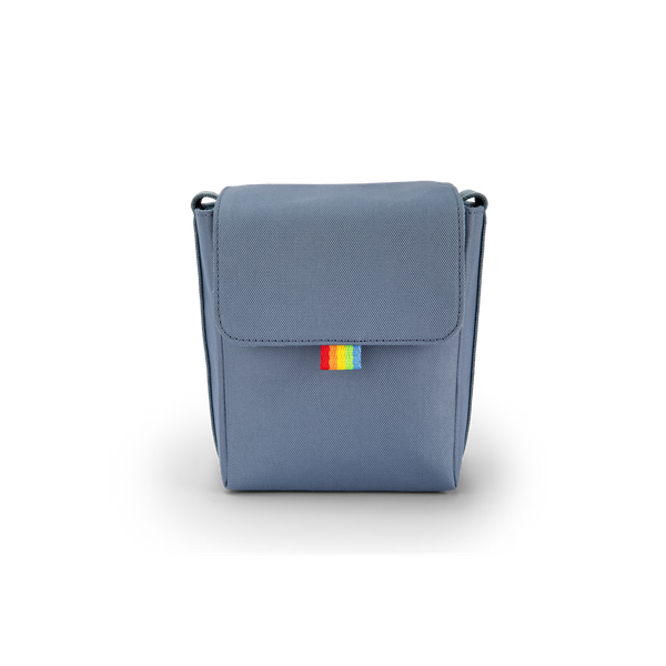 Blue rectangular bag with a colorful tag on a white background