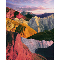A scenic mountain landscape print showing jagged peaks in pink, orange, green, and gray tones under a soft pink and blue sky.