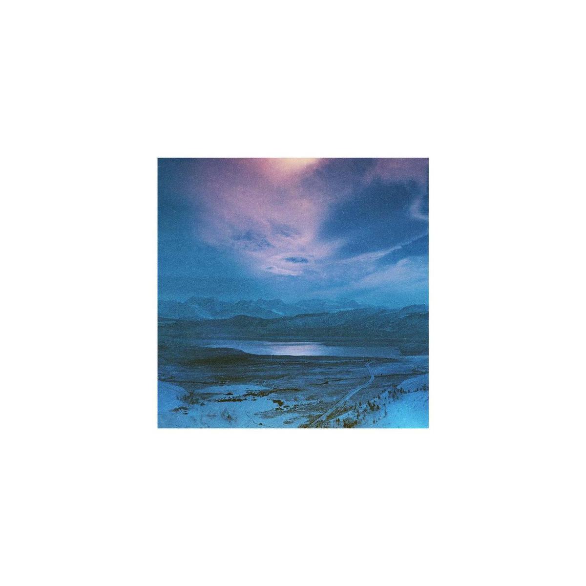 Mountain landscape with blue and violet color shifts from Revolog 460nm 35mm film.