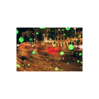 Night street scene with motion blur, overlaid with glowing green orb effects from Revolog Volvox 35mm color film.